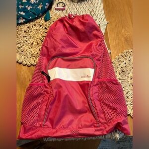 Athletico hot pink drawstring bag with mesh pockets backpack